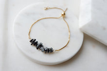 Load image into Gallery viewer, Hematite "GAIA" tumbled stone necklace and bracelets.
