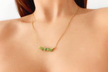 Load image into Gallery viewer, Emerald "SENTA" tumbled stone necklace and bracelets.
